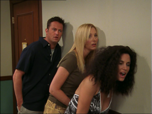 Chandler, Phoebe and Monica listen in. 